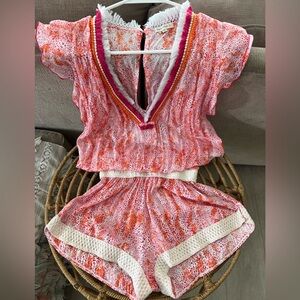 Poupette St. Barth Pink and Orange Textured romper